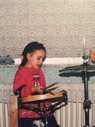 Charlotte was always interested in drums.
